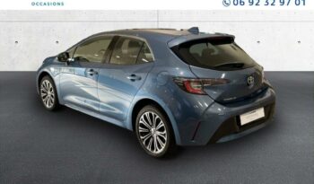 Occasion à vendre : Toyota voiture bleu denim métallisé hybride : essence/electrique 122h design my21 Reunion